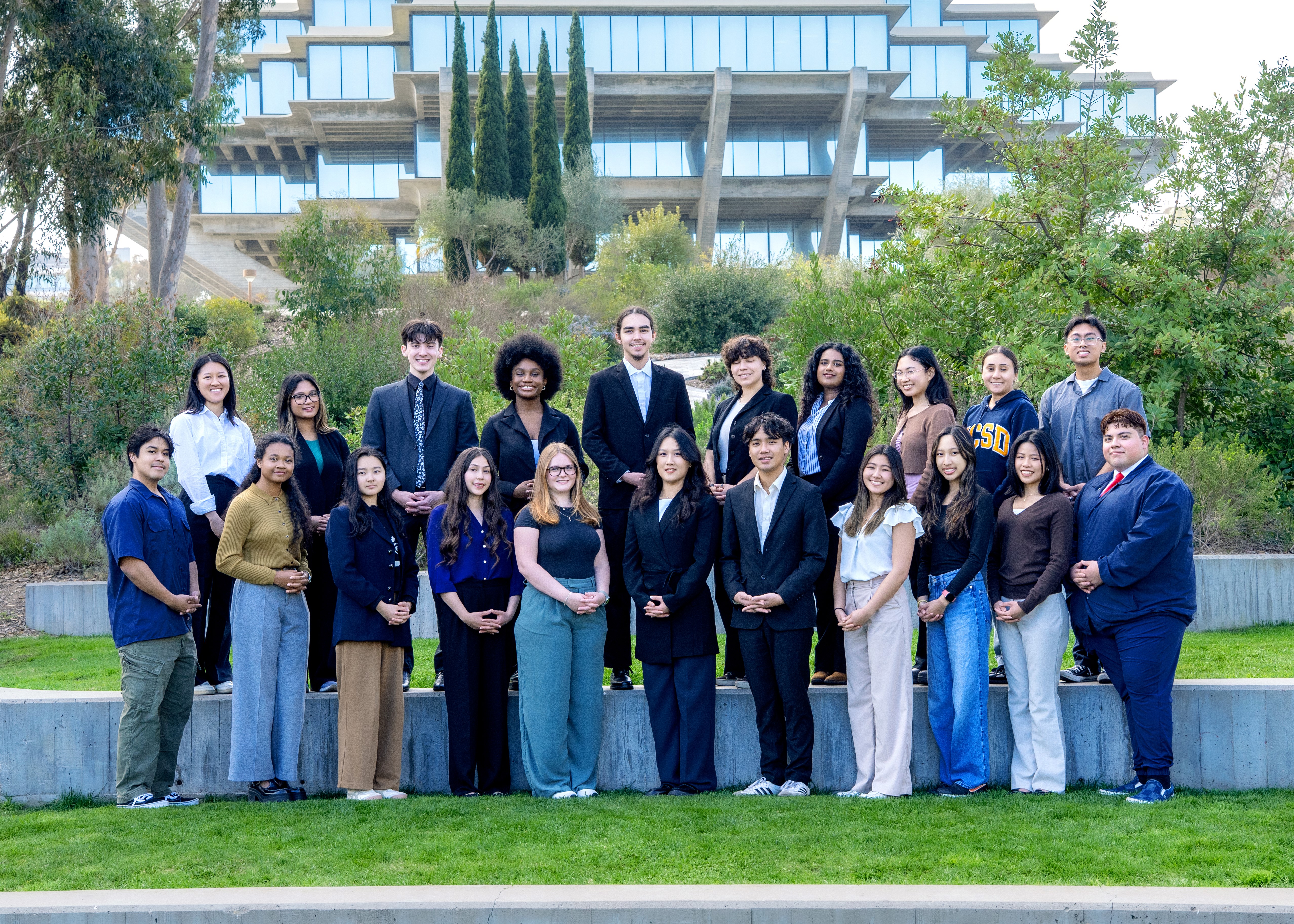 group photo of the 2024-2025 cohort of BRAP Scholars standing in front of Geisel Library